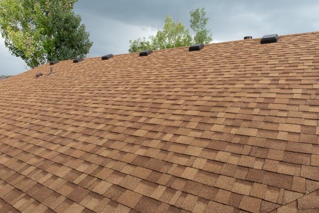 new asphalt shingles installed on house roof in fort collins co