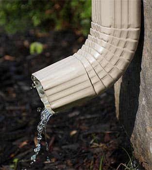 water running out of a downspout