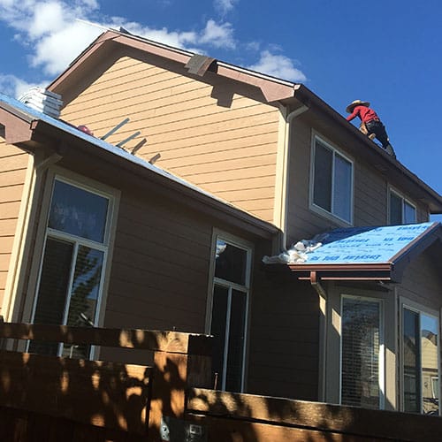 neighbors getting a new roof installed in fort collins