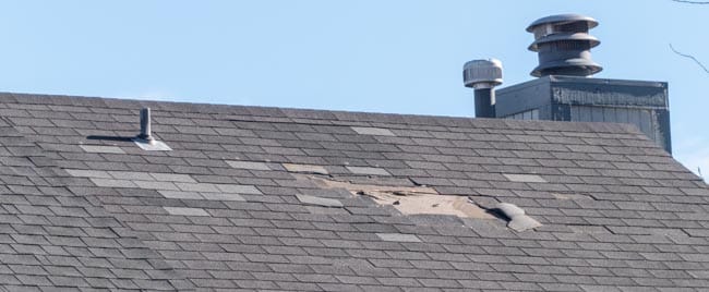 roof that needs repair. has missing shingles