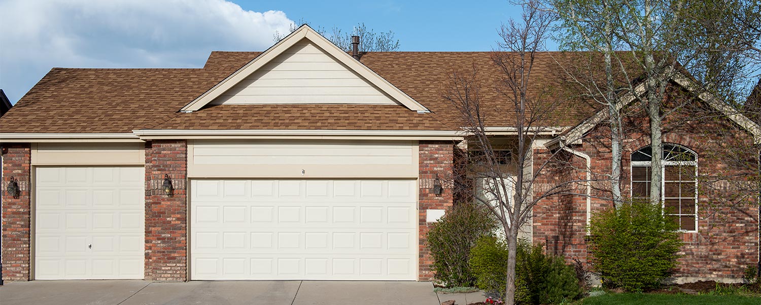 front of a house with a new shingle roof