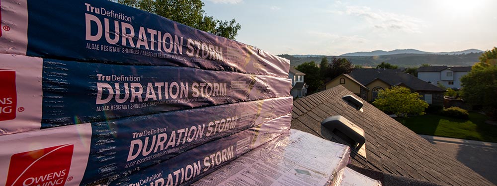 new roofing shingles about to be installed onto house