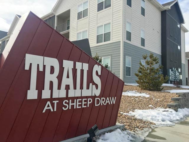 sign for Trails at Sheep Draw apartments