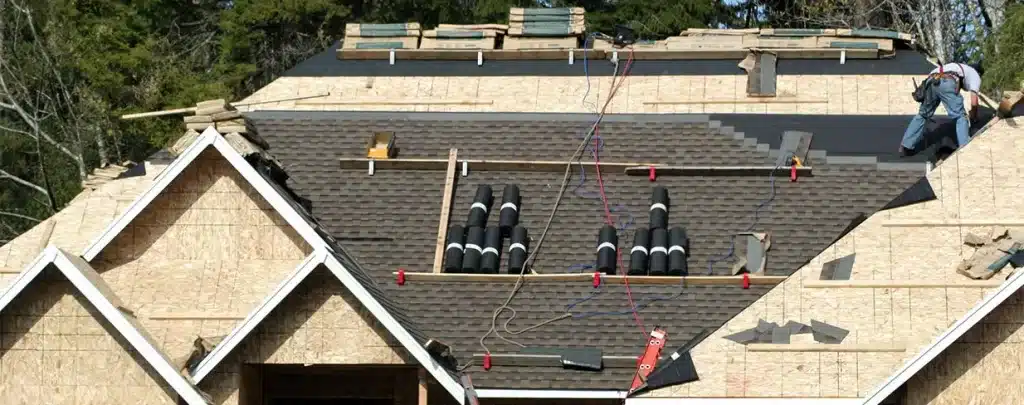 image of workers installing a new asphalt shingle roof