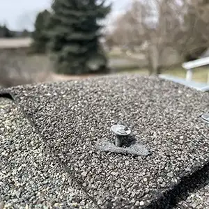 a loose nail in asphalt shingle roof fort collins