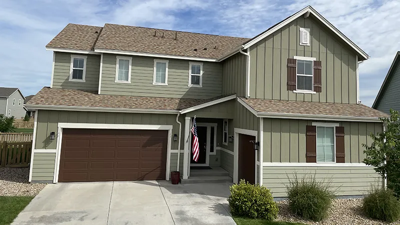 house with new asphalt shingle roof