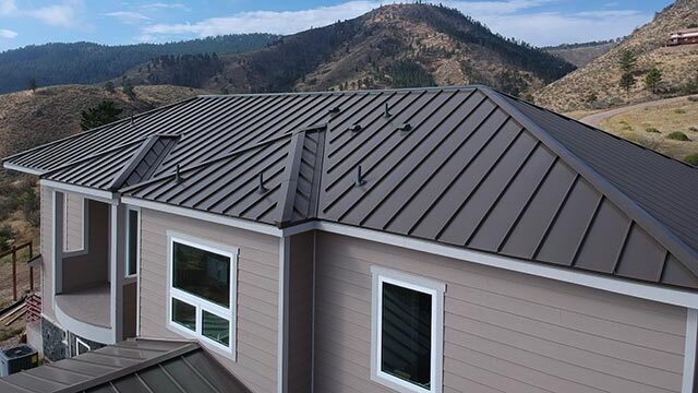 new standing seam metal roof on new home construction