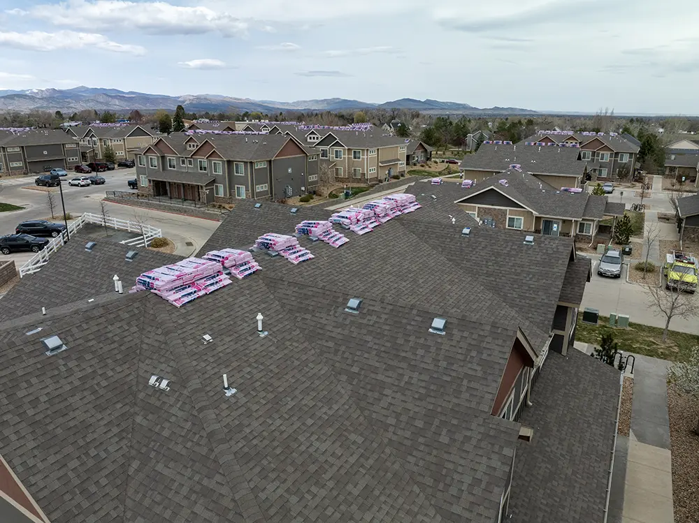 new shingles awaiting installation on multi-family complex in Berthoud, Colorado