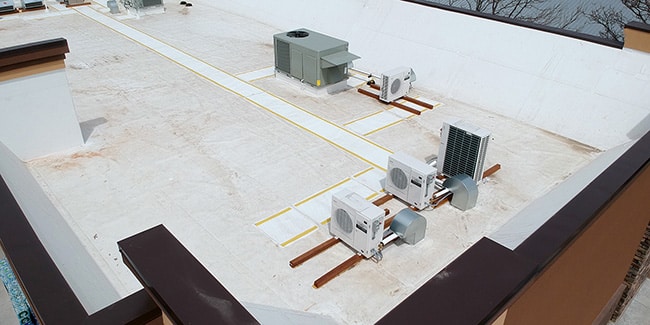 aerial view of new tpo commercial roof on convenience store