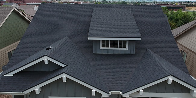 aerial view of new asphalt shingle roof on house