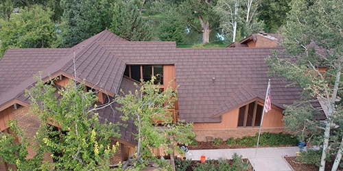 aerial view of stone-coated steel shake roof on house