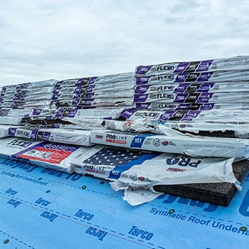 stack of Tamko Stormfighter Flex shingles on roof of home in fort collins