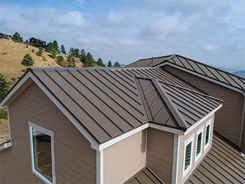 aerial view of a new standing seam roof installed