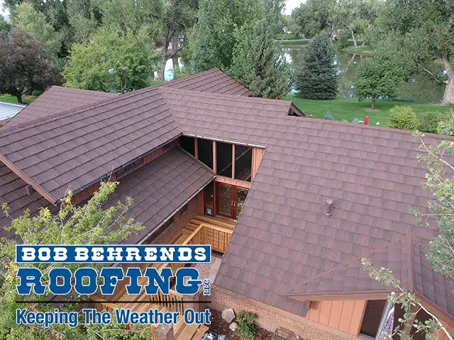 an aerial view of a new stone-coated steel roof in greeley